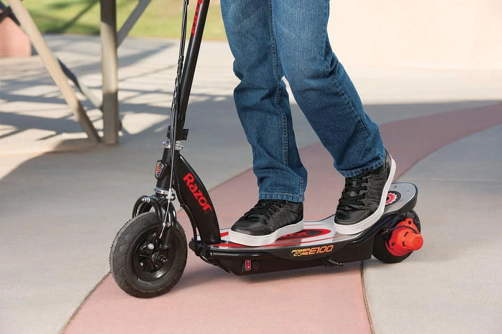 Razor Power Core E100 Electric Scooter with Aluminum Deck - Red. Ages 8+ and Up to 120 lb. 8″ Pneumatic Front Tire. Up to 11 mph and Up to 60 Mins of Ride Time. 100W Hub Motor. Unisex