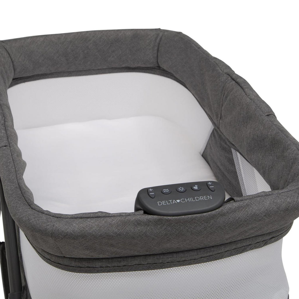 Delta Children TravelMate Compact Fold Bassinet - Features Lights. Sounds and Vibration. Grey Tweed