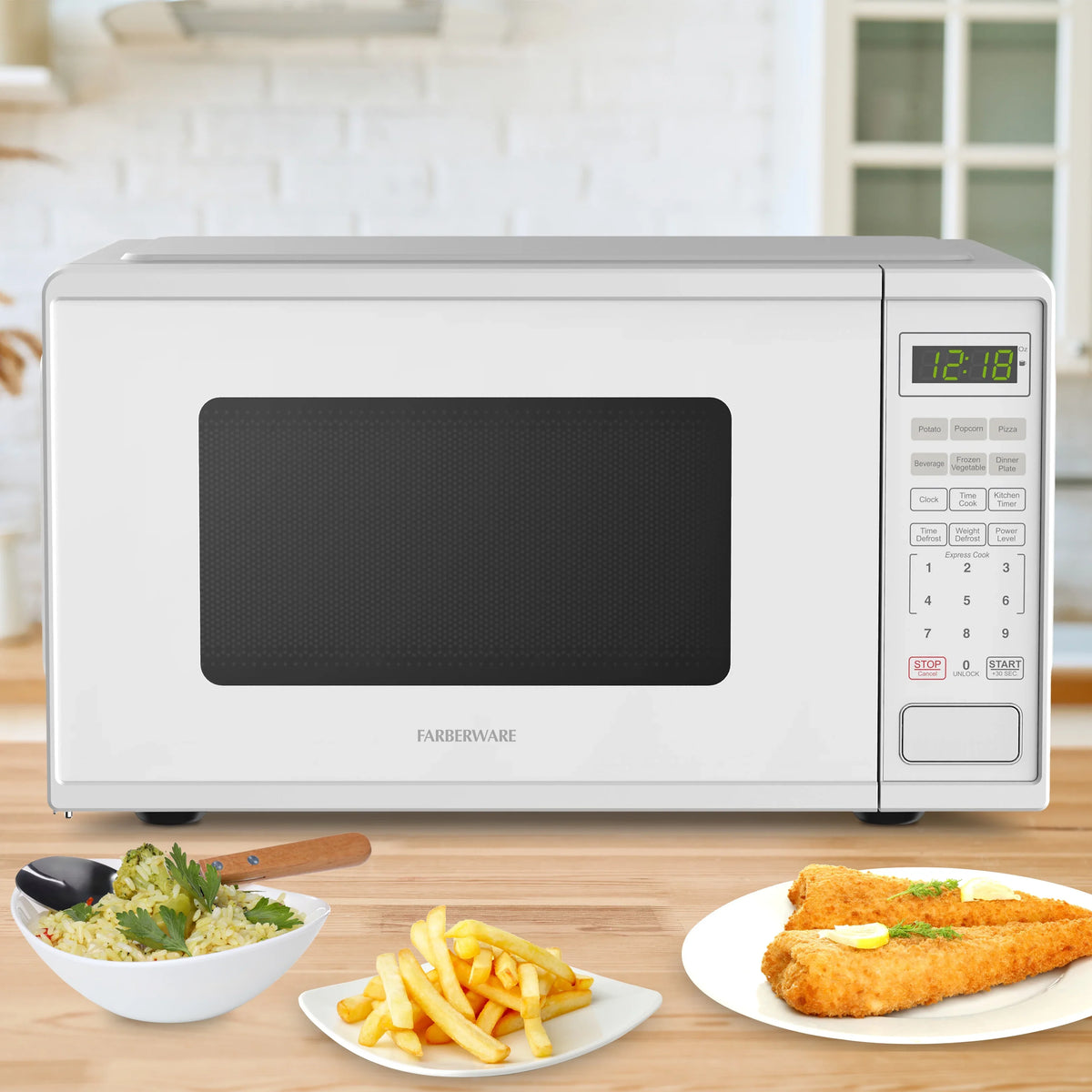 Farberware Countertop Microwave Ov 1100 Watts, 2.2 cu ft - Smart Sensor With LED Lighting and Child Lock - Perfect for Apartments and Dorms - Easy Clean Black Interior, Stainless Steel