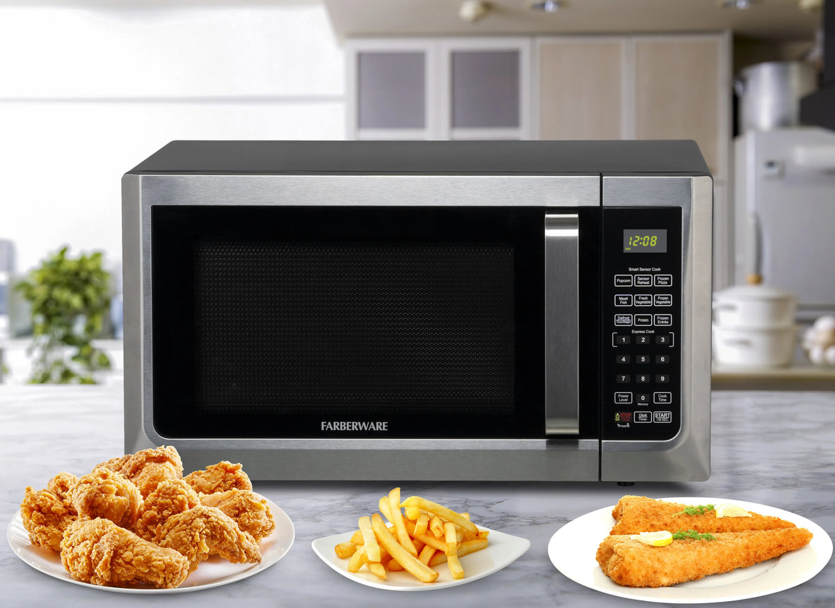 Farberware Countertop Microwave Ov 1100 Watts, 2.2 cu ft - Smart Sensor With LED Lighting and Child Lock - Perfect for Apartments and Dorms - Easy Clean Black Interior, Stainless Steel